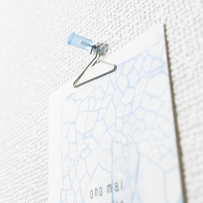 Decorate your space with photos and postcards using h concept metal hanger-shaped clips